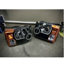 Светодиодные Bi Led фары Land Rover Discovery 3 с черными масками и ДХО