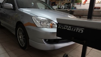 Регулировка фар Mitsubishi Lancer 9